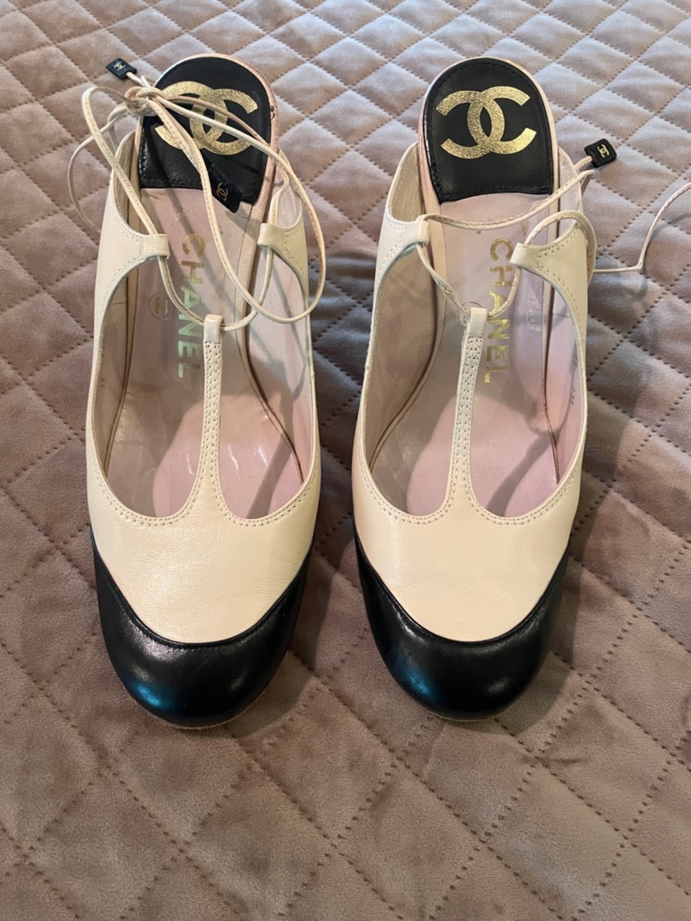 CHANEL Two-Tone T-Strap Pumps in Cream and Black with Logo Heel